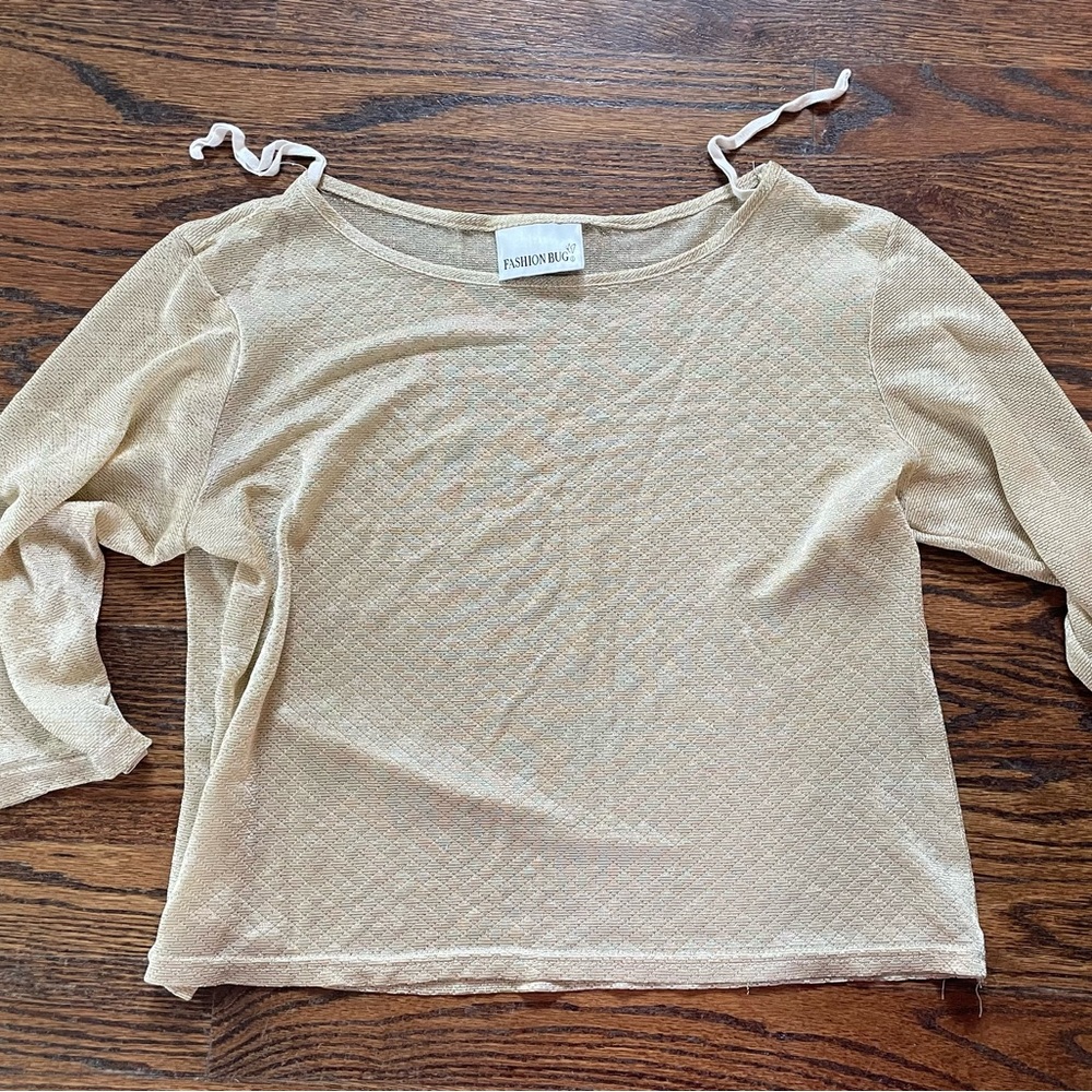Shiny, sheer gold, mid length sleeves shirt
